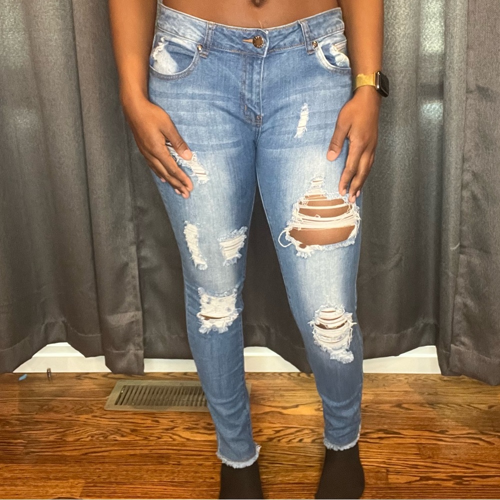 Distressed denim jeans | size 15/16